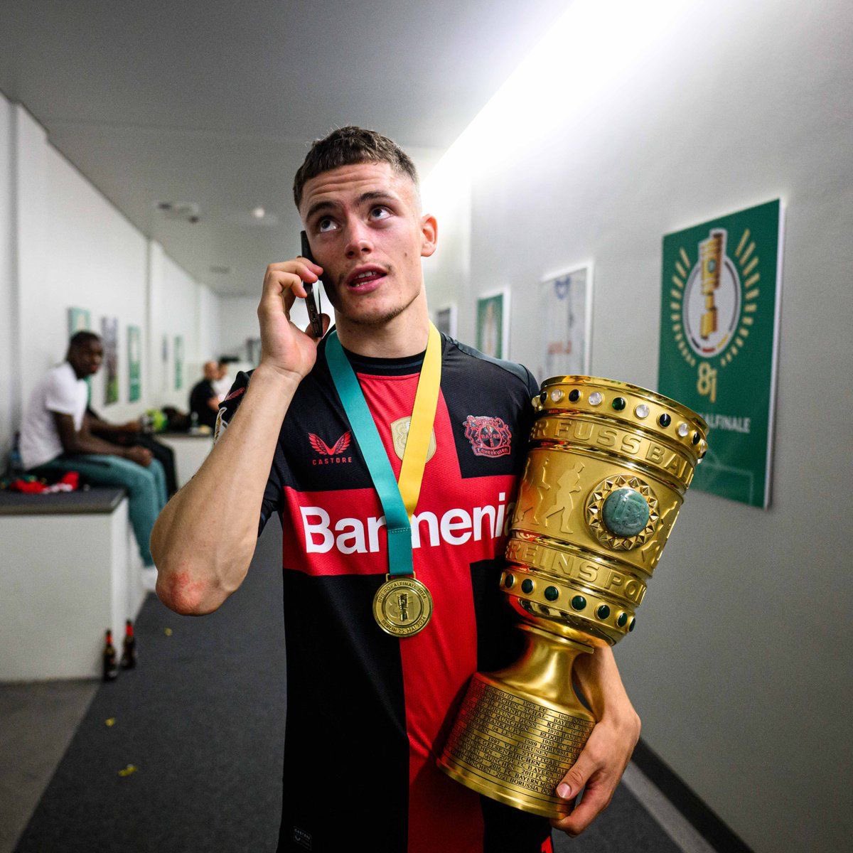 Florian Wirtz holding a cup.